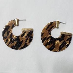 New, never worn stylish Anthropologie earrings.